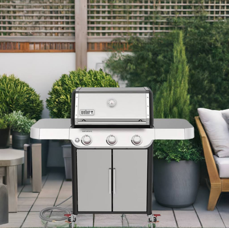 Stainless steel bbq on a patio